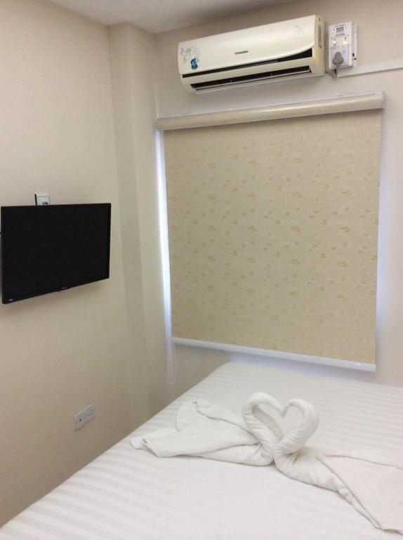 Star Max Hotel Rangum Quarto foto