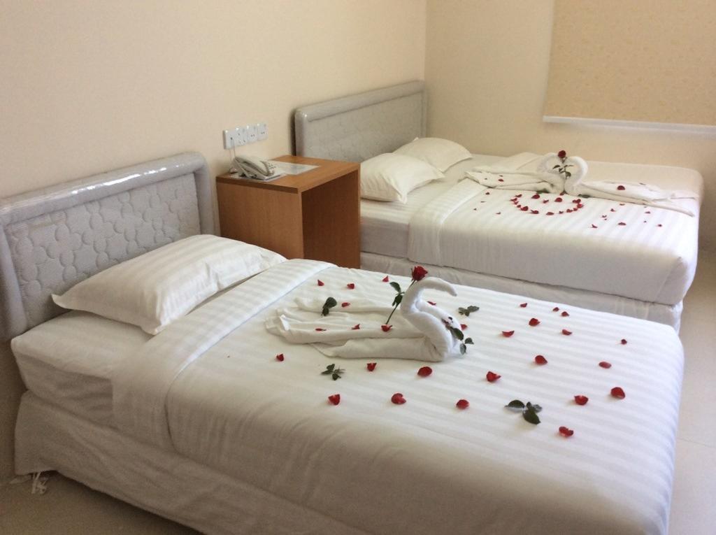 Star Max Hotel Rangum Quarto foto