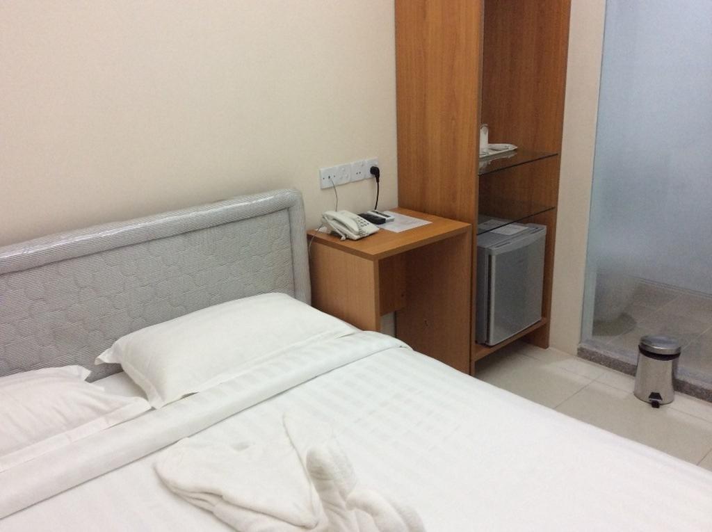 Star Max Hotel Rangum Quarto foto